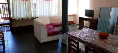 Uma televisão e/ou sistema de entretenimento em Residencial verde oliva AP 3