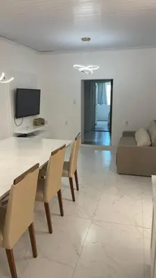 Uma televisão e/ou sistema de entretenimento em Morada Som do Mar