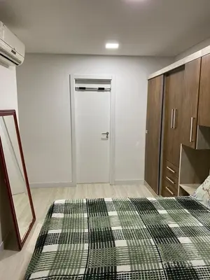 Uma cama ou camas num quarto em Itapema apartment