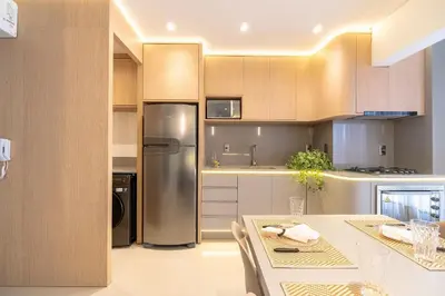 A cozinha ou kitchenette de Achei Itapema • 1003B, Mirante das Oliveiras