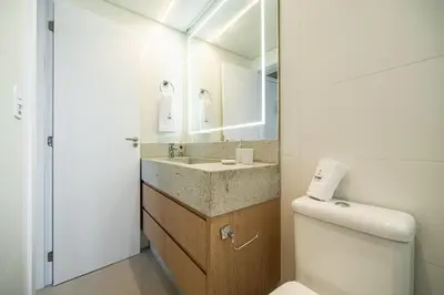 Uma casa de banho em Achei Itapema • 1003B, Mirante das Oliveiras