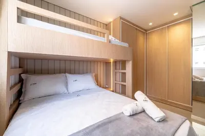 Uma cama ou camas num quarto em Achei Itapema • 1003B, Mirante das Oliveiras