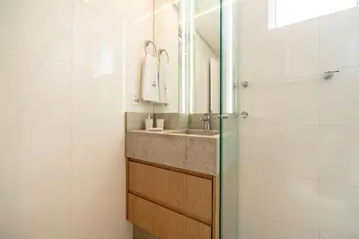 Uma casa de banho em Achei Itapema • 1003B, Mirante das Oliveiras