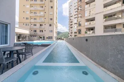 A piscina em ou perto de Achei Itapema • 1003B, Mirante das Oliveiras