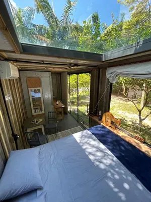 Uma cama ou camas num quarto em Tree House