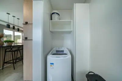 A cozinha ou kitchenette de Com garagem e vista mar em Itapema SP8184