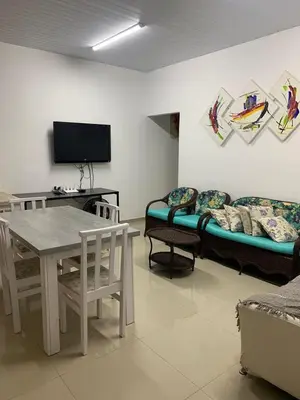 Uma televisão e/ou sistema de entretenimento em Casa de Praia, a 250 metros do mar, com piscina exclusiva