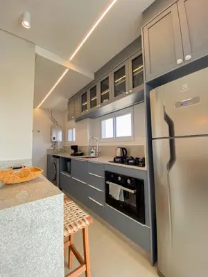 A cozinha ou kitchenette de Conforto e modernidade na praia 400m - mar