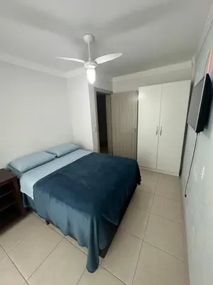 Uma cama ou camas num quarto em Casa com 02 quartos, Meia Praia - Itapema