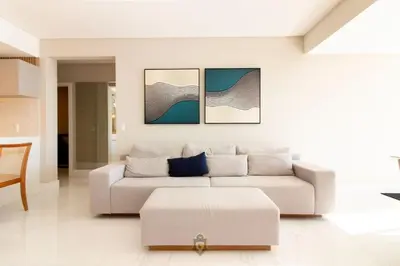 Uma área de estar em Apartamento frente mar aconchegante e impecável - Alto Padrão