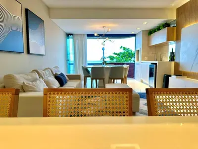 Uma área de estar em Apartamento frente mar aconchegante e impecável - Alto Padrão