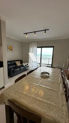 Uma área de estar em 03 APARTAMENTO BEIRA MAR NO 2º ANDAR - Apto 03