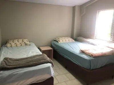 Uma cama ou camas num quarto em Private Sobrado Alugo