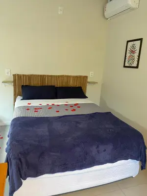 Uma cama ou camas num quarto em Loft Para Casais com Jacuzzi - Geminado - Unidade 1 Pipeline - Sem Café da Manhã