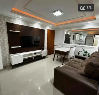 Uma área de estar em Edifício Bella Praia 1