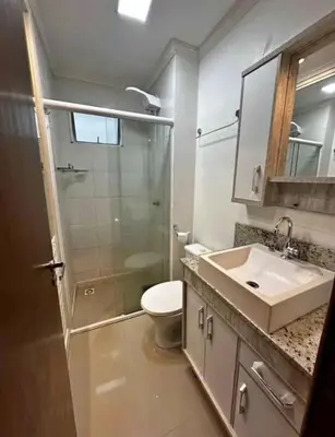 Uma casa de banho em Edifício Bella Praia 1