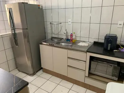 A cozinha ou kitchenette de Apto com ótima localização