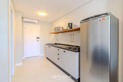 A cozinha ou kitchenette de Estúdios na Barra em Balneário Camboriú - DPR