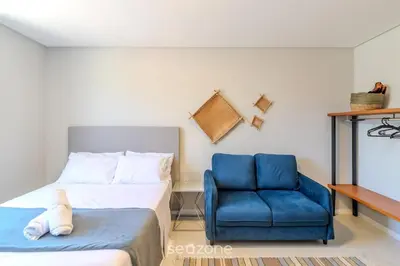 Uma cama ou camas num quarto em Estúdios na Barra em Balneário Camboriú - DPR