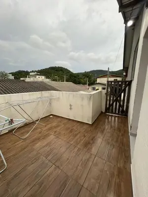 Uma varanda ou terraço em Casa a 1 km da praia