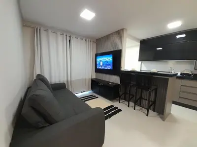 Uma televisão e/ou sistema de entretenimento em Apartamento aconchegante em Mariscal
