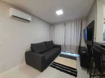 Uma televisão e/ou sistema de entretenimento em Apartamento aconchegante em Mariscal