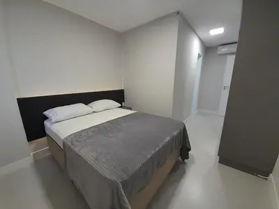 Uma cama ou camas num quarto em Apartamento aconchegante em Mariscal