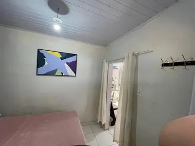 Uma televisão e/ou sistema de entretenimento em Casinha de GCR