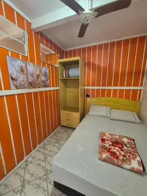 Uma cama ou camas num quarto em Casa em Ganchos