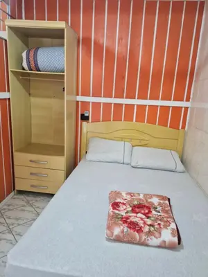 Uma cama ou camas num quarto em Casa em Ganchos