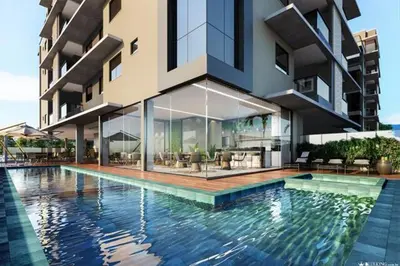 A piscina em ou perto de NOVO apartamento a poucos passos do mar