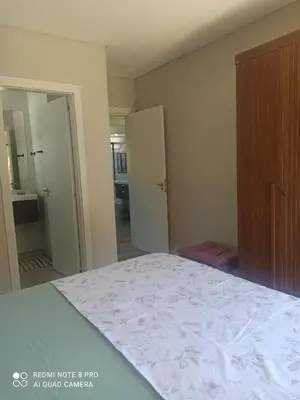Uma cama ou camas num quarto em Casa Jade duplex nova com piscina em Mariscal, Bombinhas