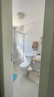 Uma casa de banho em Apartamento Porto Belo