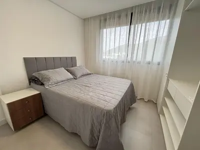 Uma cama ou camas num quarto em Apto em Home Clube na Praia de Palmas