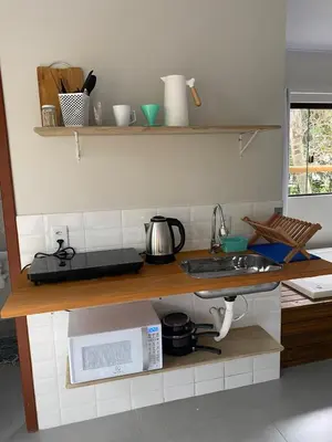 A cozinha ou kitchenette de Loft Para Casais com Jacuzzi - Geminado - Unidade 2 Sunset - Sem Café da Manã