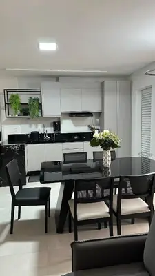 A cozinha ou kitchenette de Apartamento meia praia itapema SC 3 suítes