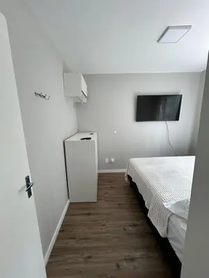 Uma cama ou camas num quarto em Apto Quadra Mar - Recém reformado