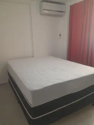 Uma cama ou camas num quarto em Exclusive apt, meters from Bombínhas beach