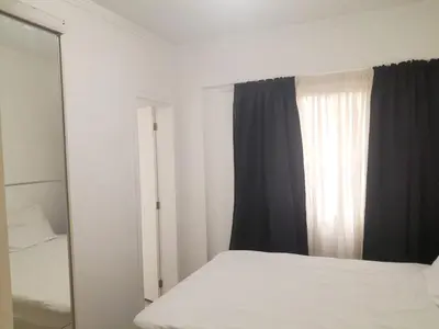 Uma cama ou camas num quarto em Exclusive apt, meters from Bombínhas beach