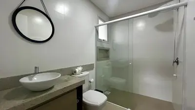 Uma casa de banho em Apto Royal com piscina - Praia de Palmas