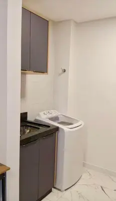 A cozinha ou kitchenette de Apartamento novíssimo, perto do mar