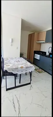A cozinha ou kitchenette de Apartamento novíssimo, perto do mar