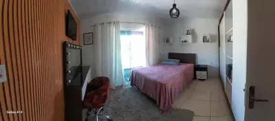 Uma cama ou camas num quarto em Casa de praia meu encanto