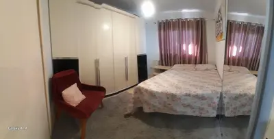 Uma cama ou camas num quarto em Casa de praia meu encanto