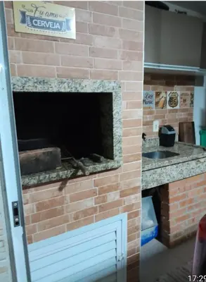 A cozinha ou kitchenette de Casa de praia meu encanto