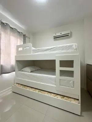 Uma cama ou camas num quarto em Apartamento Centro de bombas Punta