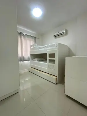 Uma cama ou camas num quarto em Apartamento Centro de bombas Punta