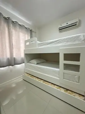 Uma cama ou camas num quarto em Apartamento Centro de bombas Punta