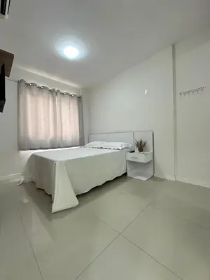Uma cama ou camas num quarto em Apartamento Centro de bombas Punta