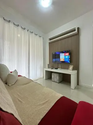 Uma televisão e/ou sistema de entretenimento em Apartamento Centro de bombas Punta